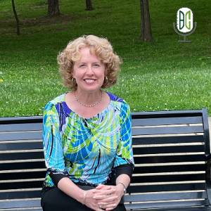 Jennifer Yowell on a bench on campus