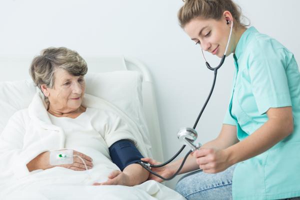 patient blood pressure being measured