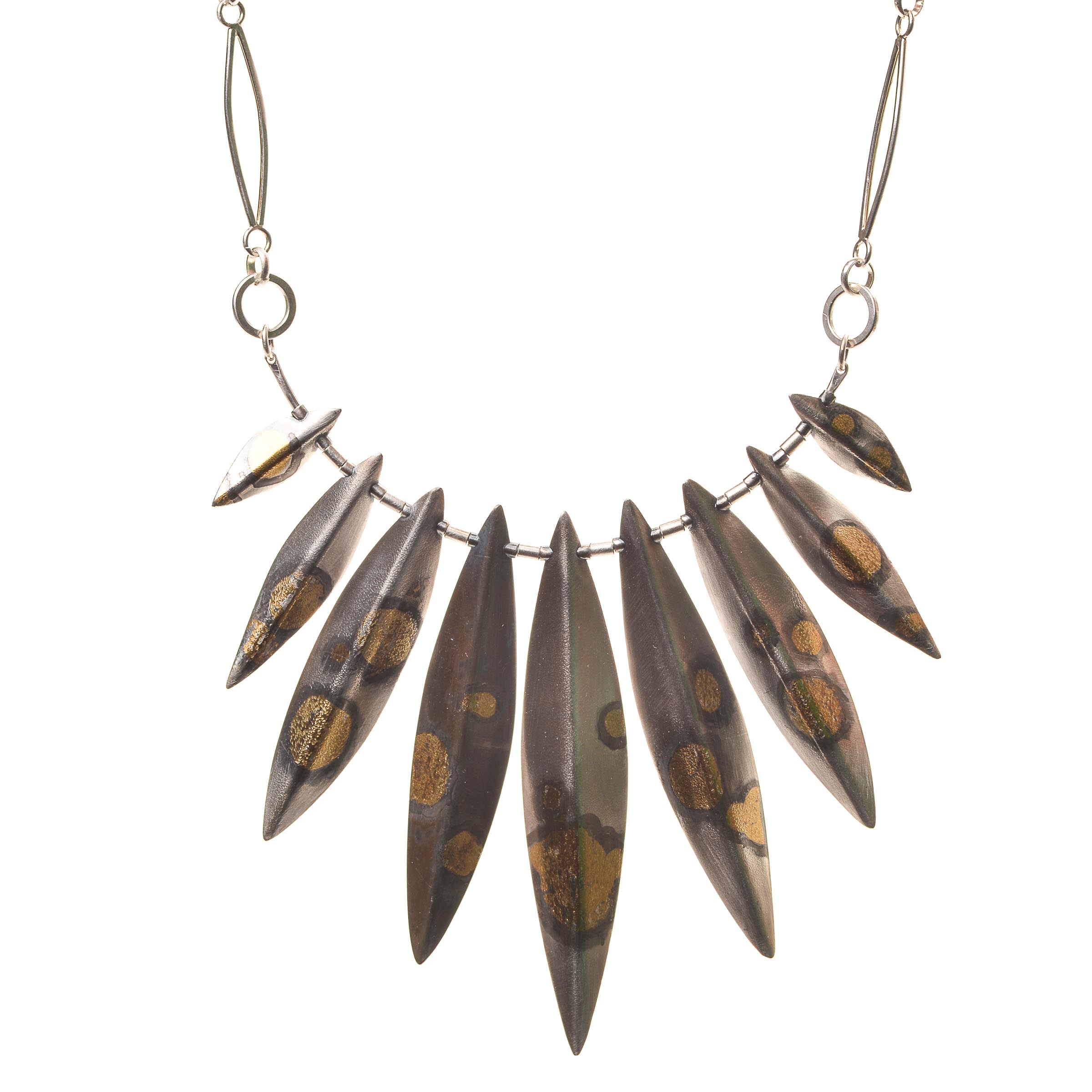 A metal necklace by artist Amy Pike.