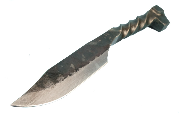 A product image from Chichester Canada Inc of a knife made from a railroad spike against a white background.