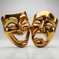 **Alt text:**   Two shiny gold theatrical masks are displayed side by side against a light gray background. The mask on the left has an exaggerated smiling expression with raised features and a wide open mouth, while the mask on the right has a frowning expression with a downward-curving mouth and a teardrop shape beneath one eye. The reflective metallic surfaces highlight the traditional comedy and tragedy symbols associated with theater and performing arts.