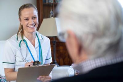 doctor with clipboard and patient