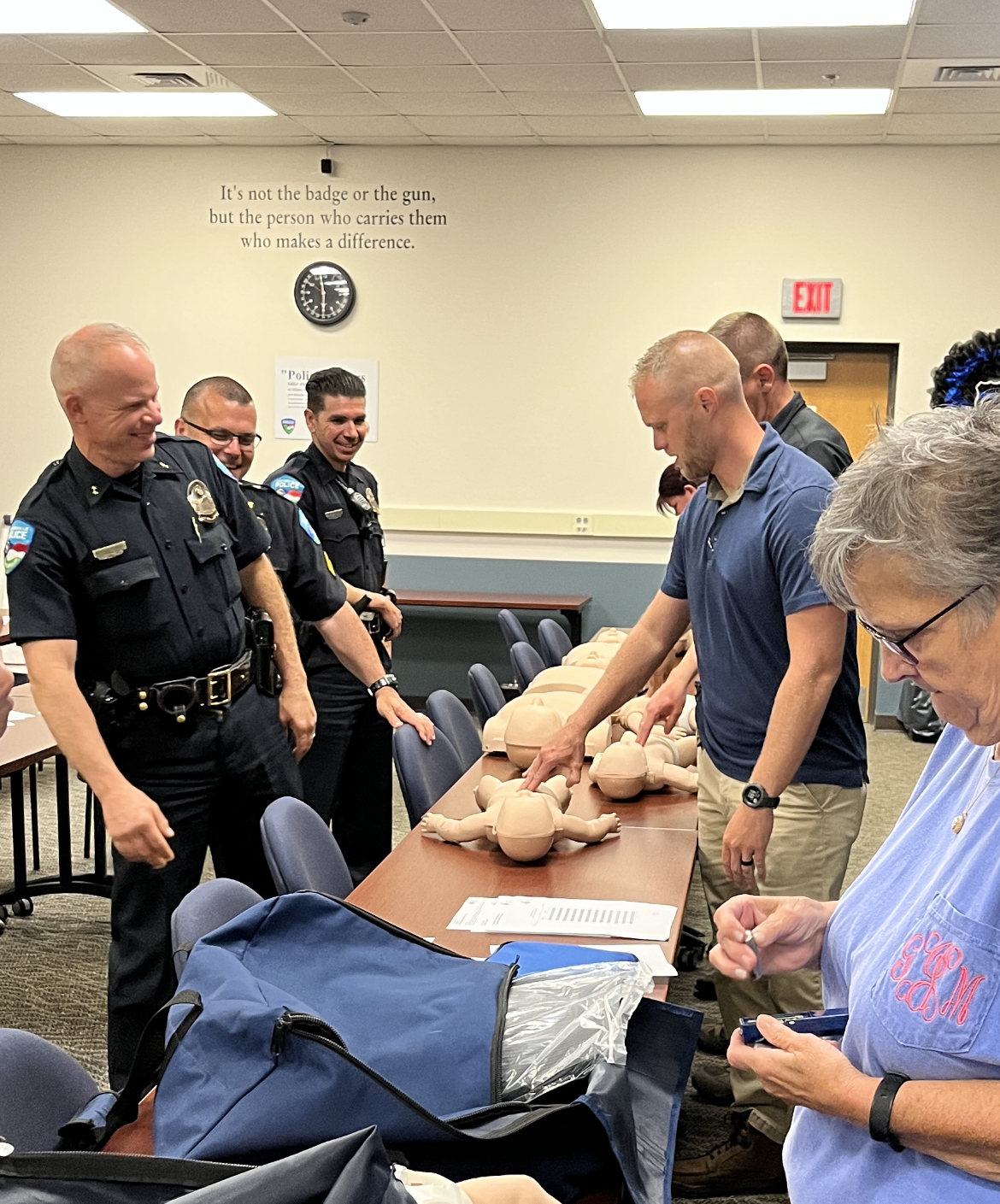 students in classroom practicing cpr