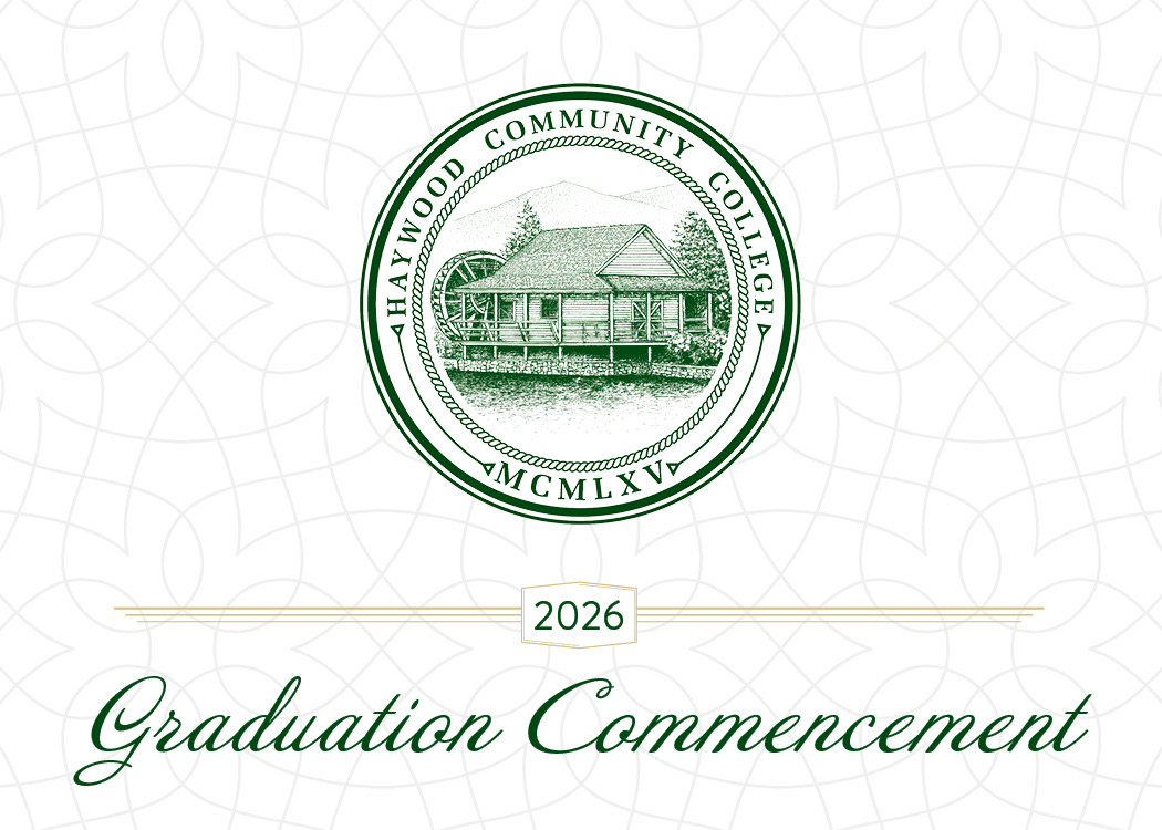 Cover design featuring the Haywood Community College seal in green, showing the campus mill building. Below the seal, decorative lines frame the year ‘2026,’ followed by the text ‘Graduation Commencement’ in elegant script on a patterned background.