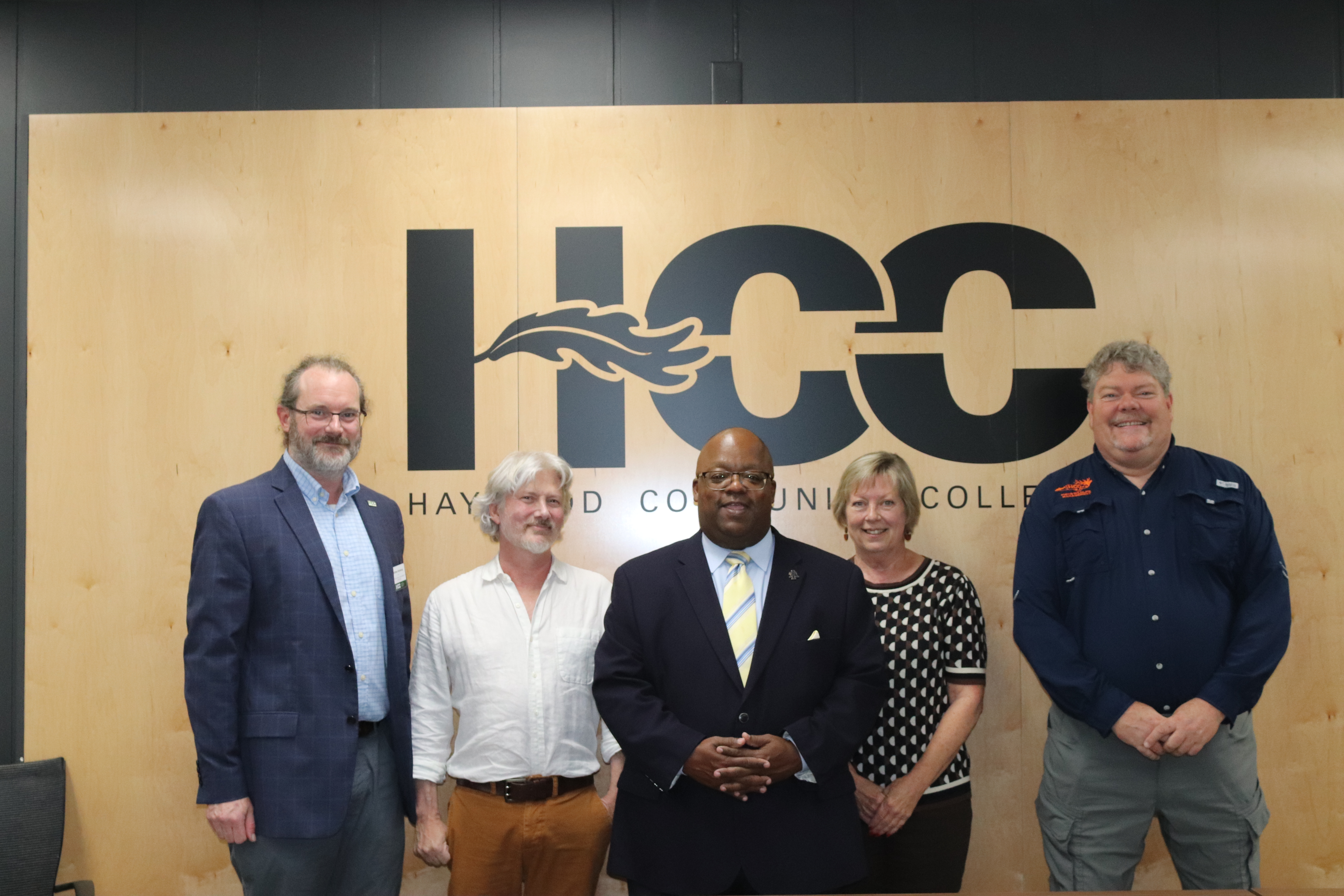 group of Natural Resources employees in front of HCC sign