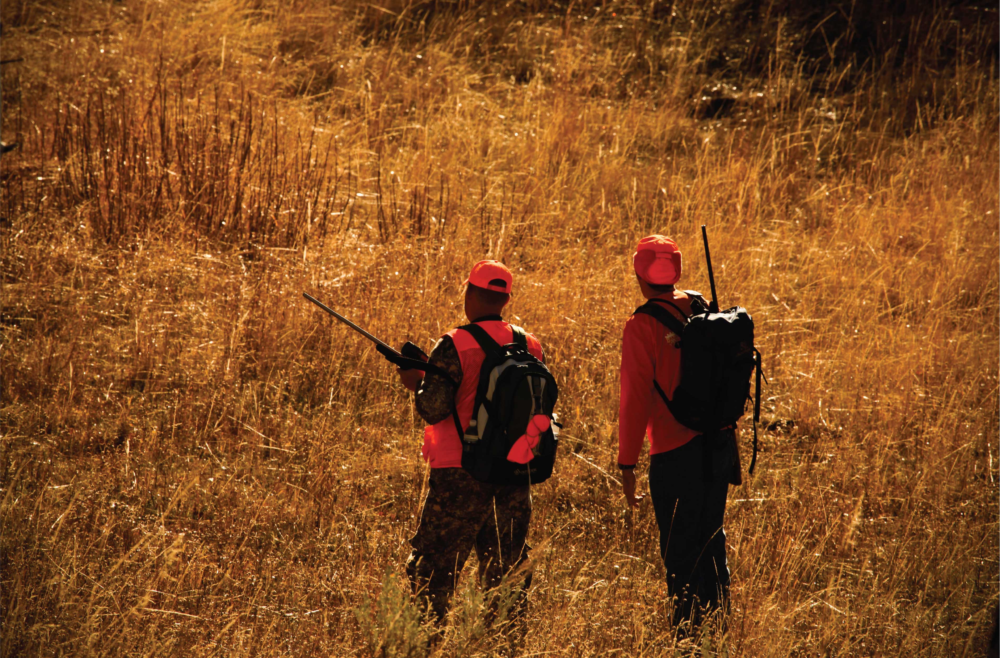 two hunters in the woods