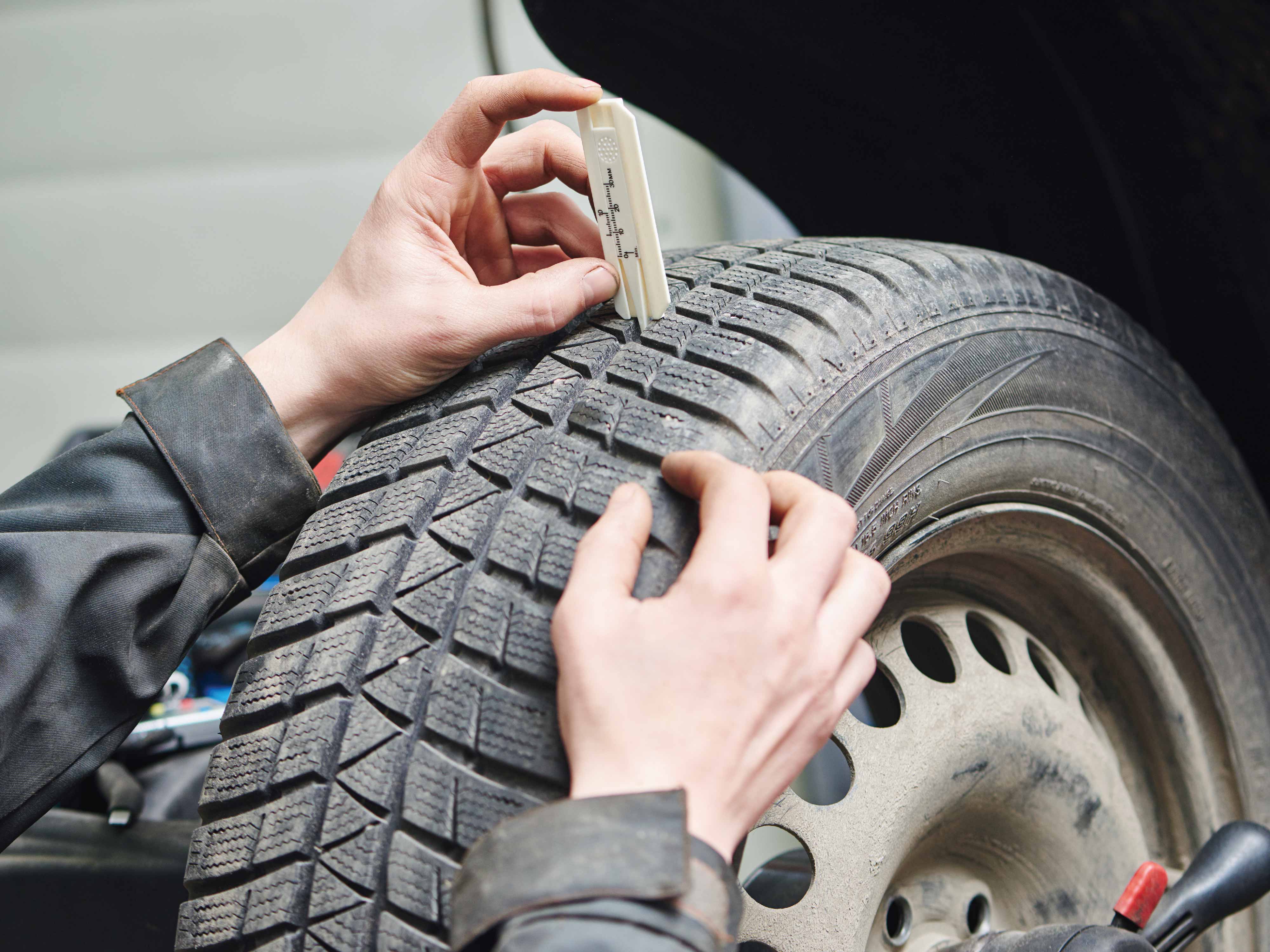 person checking tires
