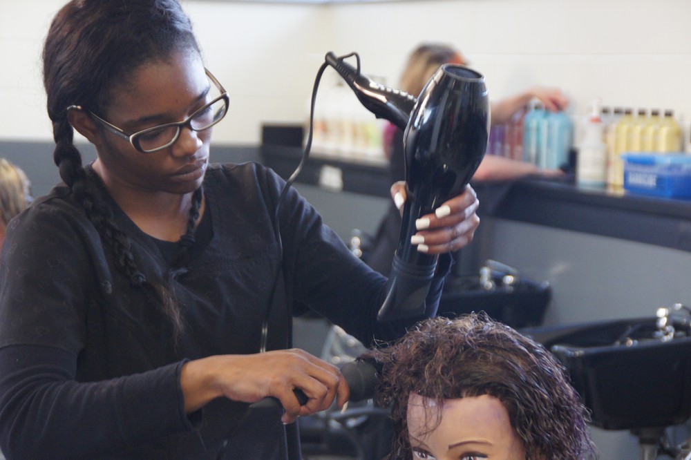 Girl doing mannequin hair