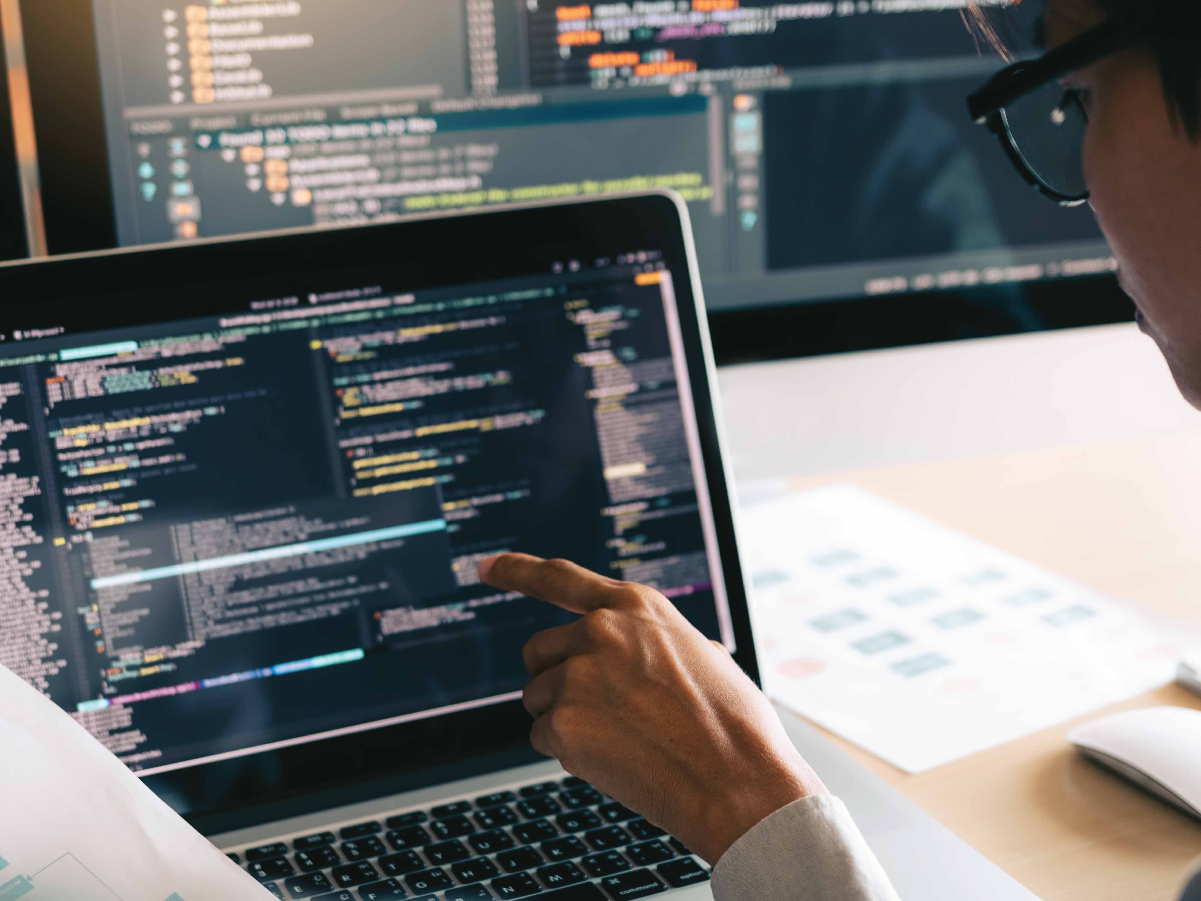 person looking at code