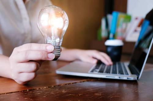 Business Idea Lightbulb and Laptop Image